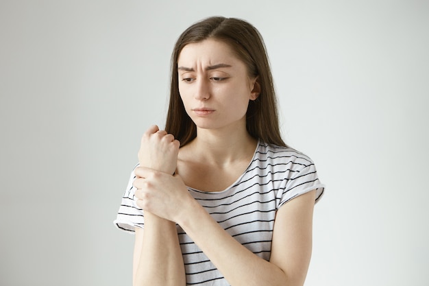 El significado del símbolo de: dolor de muñeca